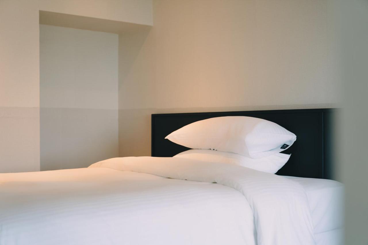 Jeju Poong Gyung Hotel Согвипхо Экстерьер фото