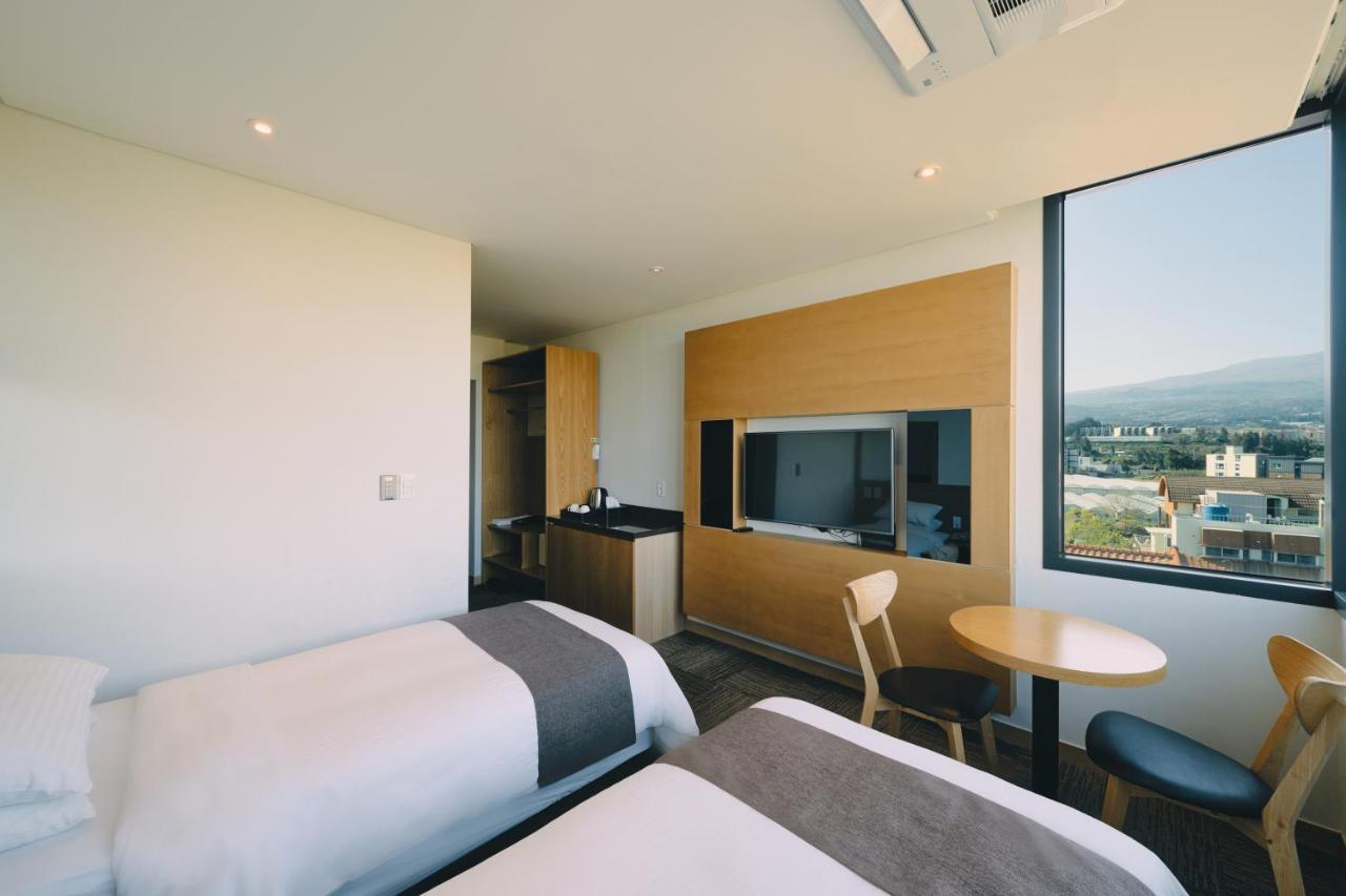 Jeju Poong Gyung Hotel Согвипхо Экстерьер фото